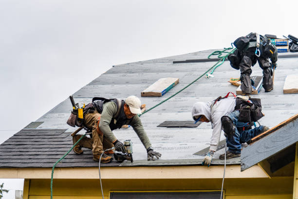 Professional Gutter Installation technician working in Hughson, CA